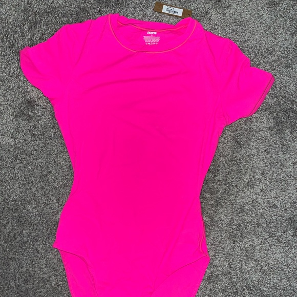 SKIMS Other - Skims NWT Neon Pink fits everybody bodysuit